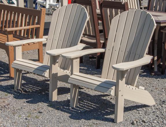 Two Woodgrain Poly Adirondack Chairs